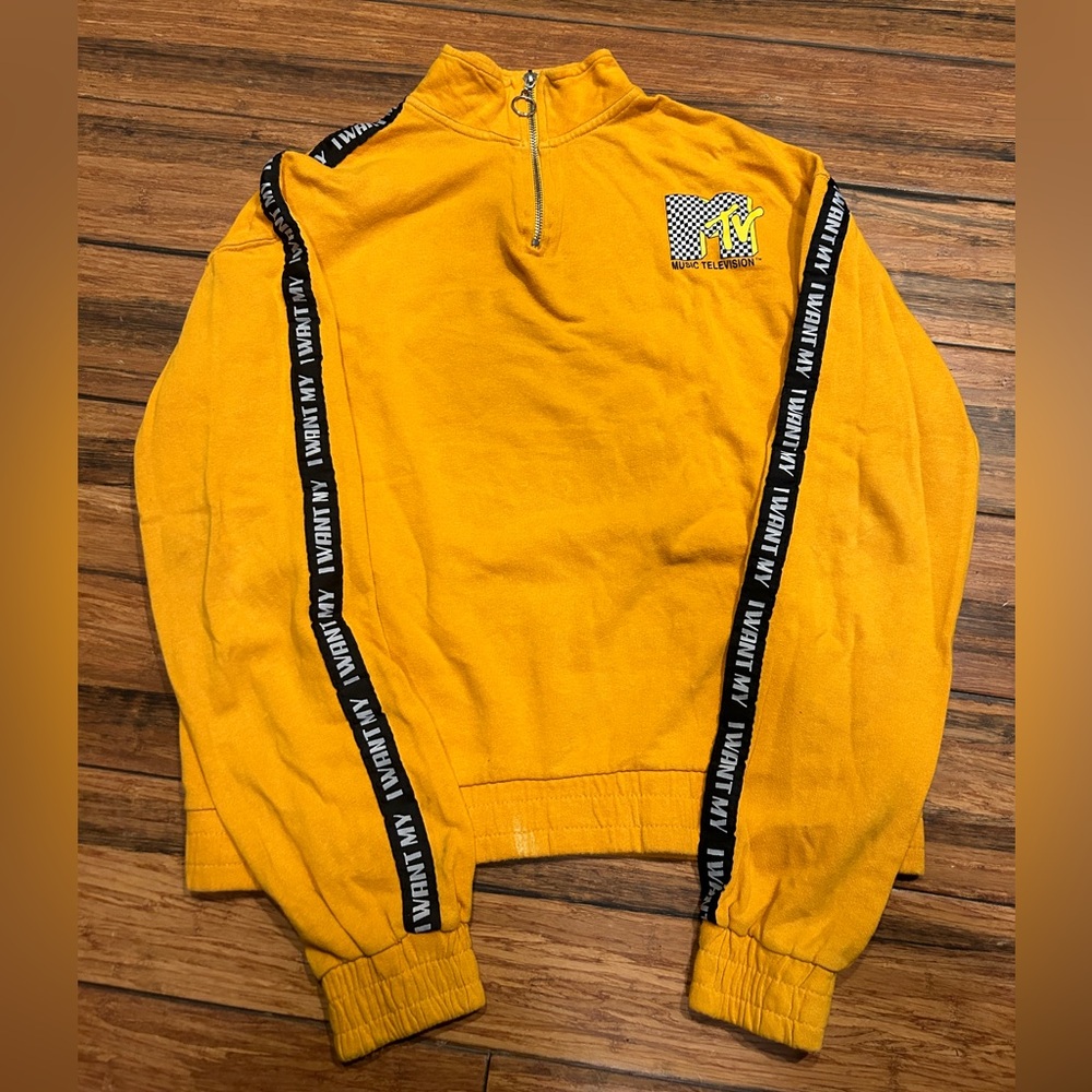 MTV pullover sweatshirt. Yellow. Juniors L. Zipper neck. Good condition.
